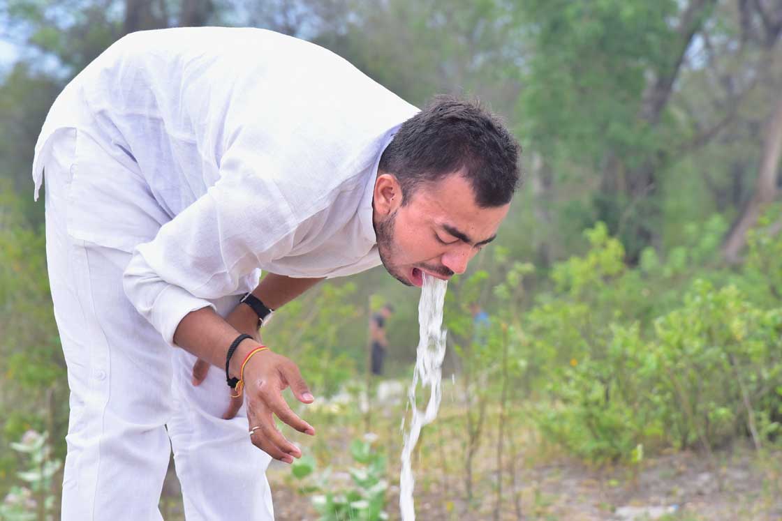 Vamana Dhauti vomit out water