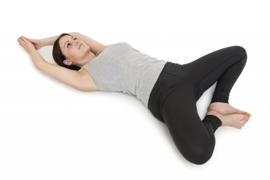 5 Restorative Yoga Poses You Can Do With Props You Have at Home