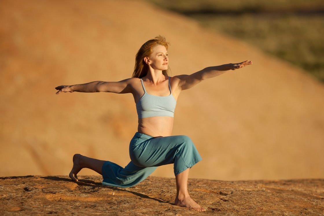 Warrior 2 Pose (Virabhadrasana 2): Benefits, Modifications & More