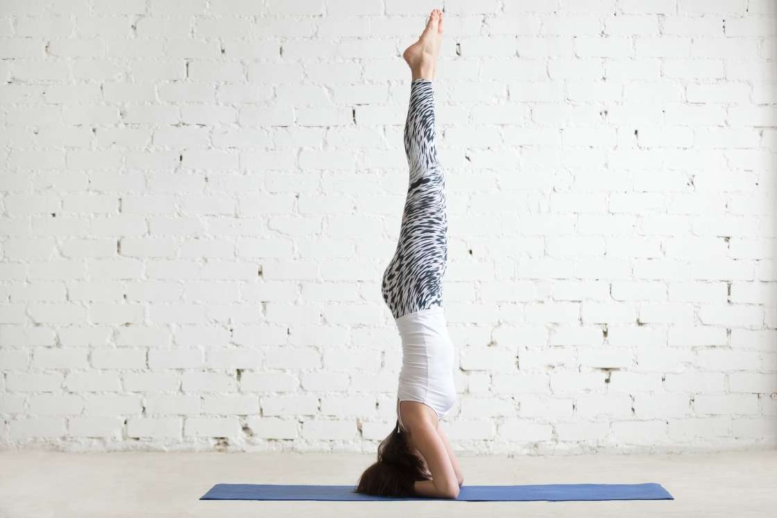 Young Yogi Attractive Woman in Headstand Pose, White Loft Backgr Stock  Image - Image of position, health: 90374593