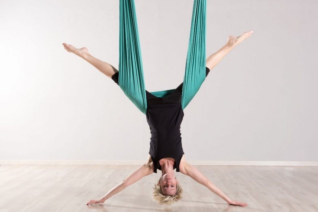 Aerial Yoga: Beginners Tips, Benefits, and Poses You Can Try - Fitsri Yoga