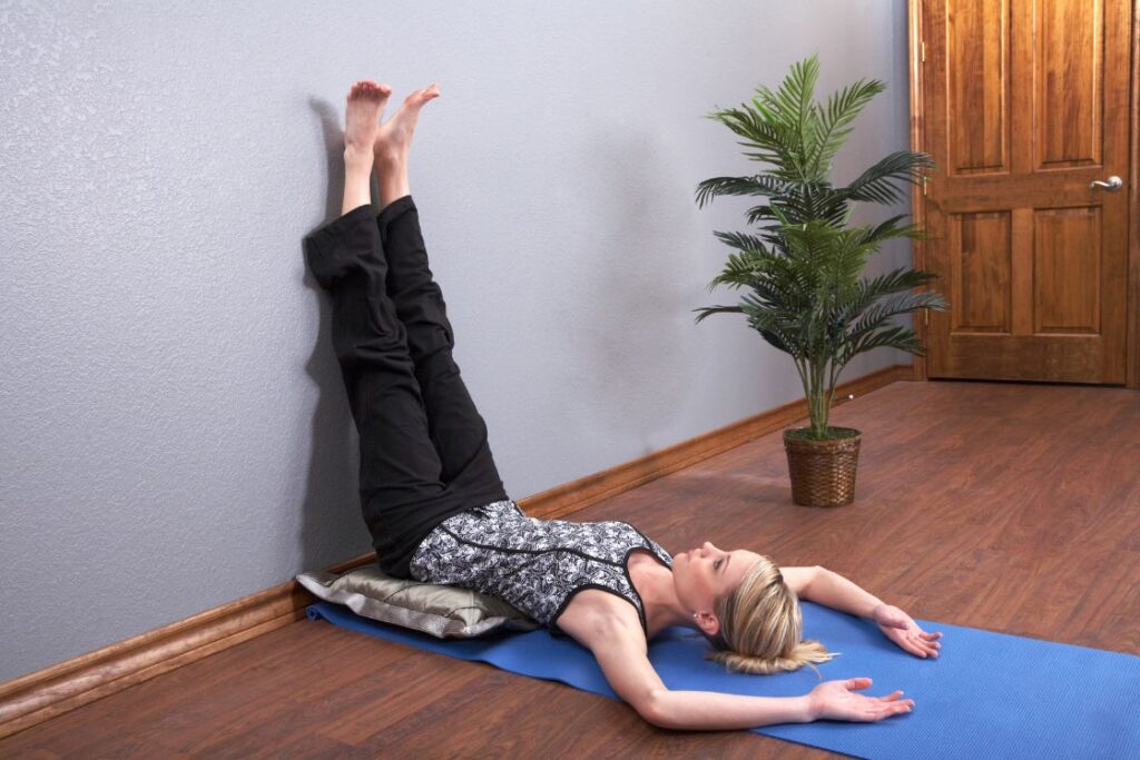 Legs Up the Wall Pose to reduce dark circle